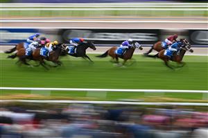 MELBOURNE, AUSTRALIA - NOVEMBER 03: James McDonald rides #8 Roots to win the Inglis Bracelet during 2022 Kennedy Oaks Day at Flemington Racecourse on November 03, 2022 in Melbourne, Australia. (Photo by Quinn Rooney/Getty Images)