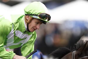 MELBOURNE, AUSTRALIA - NOVEMBER 03: James McDonald returns to scale on Matron Bullwinkle after winning race 1 the TCL TV Stakes during 2022 Kennedy Oaks Day at Flemington Racecourse on November 03, 2022 in Melbourne, Australia. (Photo by Darrian Traynor/Getty Images)