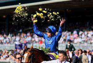 LEXINGTON, KENTUCKY - NOVEMBER 04: Jockey William Buck celebrates after his horse Mischief Magic won the Juvenile Turf Sprint during the 2022 Breeders Cup at Keeneland Race Course on November 04, 2022 in Lexington, Kentucky. (Photo by Andy Lyons/Getty Images)