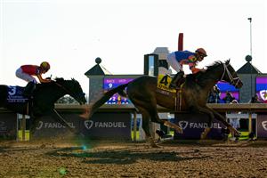 LEXINGTON, KENTUCKY - NOVEMBER 04: Jockey Irad Ortiz Jr. rides Forte to win the FanDuel Breeders
