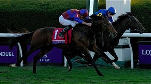 LEXINGTON, KENTUCKY - NOVEMBER 04: Jockey Ryan Moore rides Victoria Road to win the Breeder