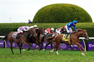LEXINGTON, KENTUCKY - NOVEMBER 05: Jockey William Buick rides Modern Games to win the FanDuel Breeders