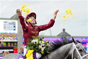 LEXINGTON, KENTUCKY - NOVEMBER 05: Jockey Tyler Gaffalione celebrates after riding Caravel to win the Breeders