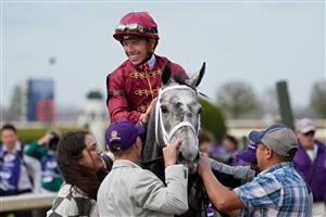 LEXINGTON, KENTUCKY - NOVEMBER 05: Jockey Tyler Gaffalione celebrates after riding Caravel to win the Breeders