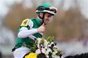 LEXINGTON, KENTUCKY - NOVEMBER 05: Jockey Flavien Prat celebrates after riding Flightline to win the Longines Breeders