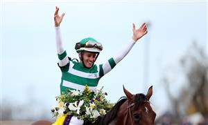 LEXINGTON, KENTUCKY - NOVEMBER 05: Jockey Flavien Prat celebrates after riding Flightline to win the Longines Breeders