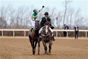LEXINGTON, KENTUCKY - NOVEMBER 05: Jockey Flavien Prat celebrates after riding Flightline to win the Longines Breeders