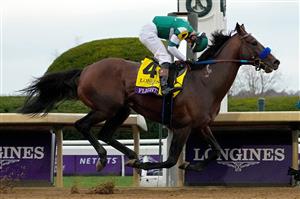 LEXINGTON, KENTUCKY - NOVEMBER 05: Jockey Flavien Prat rides Flightline to win the Longines Breeders