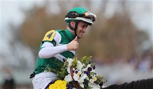 LEXINGTON, KENTUCKY - NOVEMBER 05: Jockey Flavien Prat celebrates after riding Flightline to win the Longines Breeders