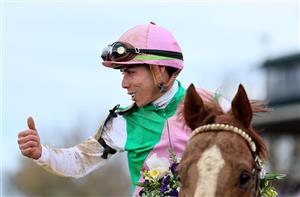 LEXINGTON, KENTUCKY - NOVEMBER 05: Jockey Irad Ortiz Jr. celebrates after riding Elite Power to win the Qatar Racing Breeders