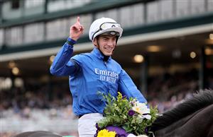 LEXINGTON, KENTUCKY - NOVEMBER 05: Jockey James Doyle celebrates after riding Rebel