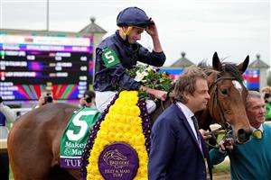 LEXINGTON, KENTUCKY - NOVEMBER 05: Jockey Ryan Moore celebrates after riding Tuesday to win the Maker
