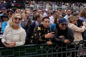 LEXINGTON, KENTUCKY - NOVEMBER 05: Fans react to Malathaat winning the Longines Breeders