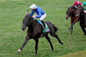 LEXINGTON, KENTUCKY - NOVEMBER 05: Jockey William Buick rides Modern Games to win the FanDuel Breeders