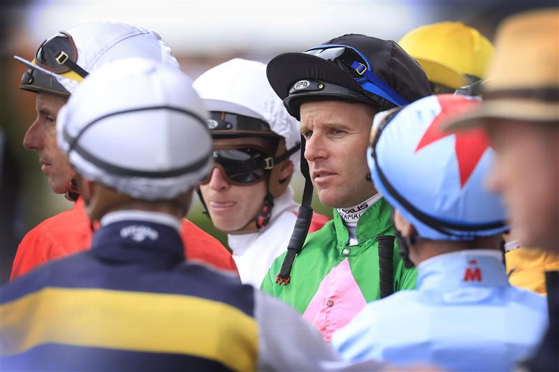 NEWCASTLE, AUSTRALIA - NOVEMBER 12: Tommy Berry looks on during Sydney Racing at Newcastle Racecourse on November 12, 2022 in Newcastle, Australia. (Photo by Mark Evans/Getty Images)