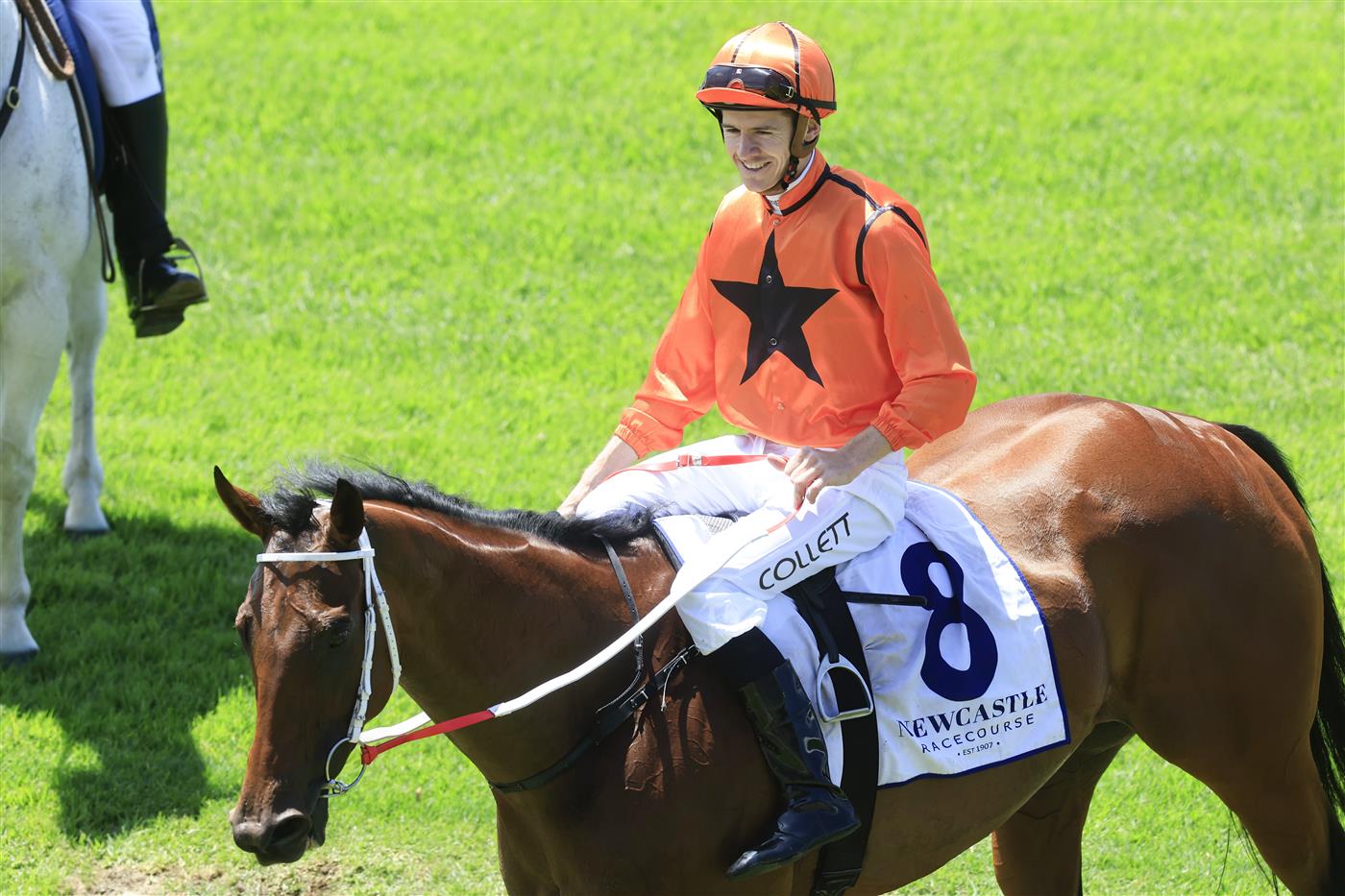 NEWCASTLE, AUSTRALIA - NOVEMBER 12: Jason Collett on Ten Bells returns to scale after winning race 3 the Doubletree By Hilton Karaka F&m Bm78 during Racing at Newcastle Racecourse on November 12, 2022 in Newcastle, Australia. (Photo by Mark Evans/Getty Images)