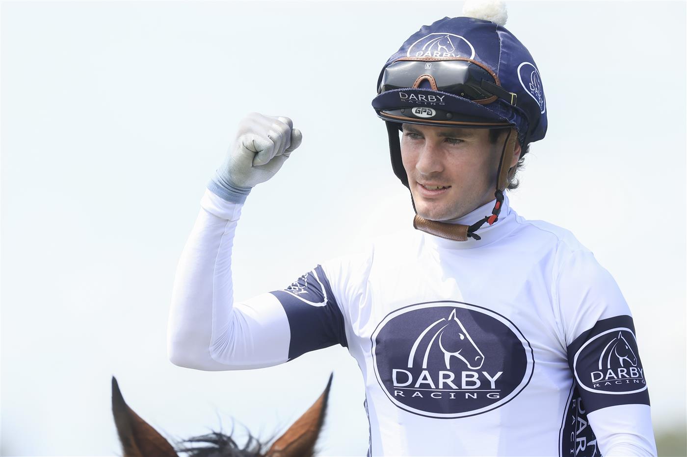 NEWCASTLE, AUSTRALIA - NOVEMBER 12: Tyler Schiller celebrates after winning race 4 the Nzb Insurance The Beauford on King Frankel during Racing at Newcastle Racecourse on November 12, 2022 in Newcastle, Australia. (Photo by Mark Evans/Getty Images)
