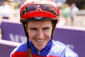 NEWCASTLE, AUSTRALIA - NOVEMBER 12: Jason Collett smiles after winning race 2, the TAB Highway Handicap during Racing at Newcastle Racecourse on November 12, 2022 in Newcastle, Australia. (Getty)