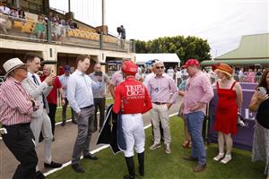 NEWCASTLE, AUSTRALIA - NOVEMBER 12: Connections talk to Sam Clipperton after winning race 7 New Zealand Bloodstock Njc Spring Stakes with Pierossa during Racing at Newcastle Racecourse on November 12, 2022 in Newcastle, Australia. (Photo by Mark Evans/Getty Images)