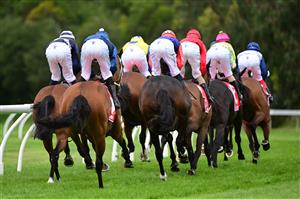 CRANBOURNE, AUSTRALIA - NOVEMBER 12: Jockey's rounding the turn during Melbourne Racing on Cranbourne Cup Day at Cranbourne Racecourse on November 12, 2022 in Cranbourne, Australia. (Getty)
