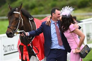 CRANBOURNE, AUSTRALIA - NOVEMBER 12: Trainer Natalie Young poses with Uncle Bryn after winning Race 7, the Ladbrokes Cranbourne Cup, during Melbourne Racing on Cranbourne Cup Day at Cranbourne Racecourse on November 12, 2022 in Cranbourne, Australia. (Photo by Vince Caligiuri/Getty Images)