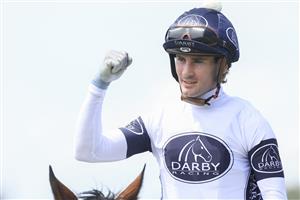 NEWCASTLE, AUSTRALIA - NOVEMBER 12: Tyler Schiller celebrates after winning race 4 the Nzb Insurance The Beauford on King Frankel during Racing at Newcastle Racecourse on November 12, 2022 in Newcastle, Australia. (Photo by Mark Evans/Getty Images)