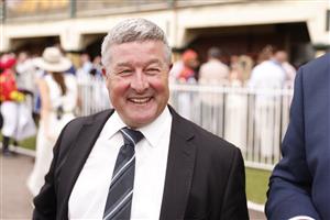 NEWCASTLE, AUSTRALIA - NOVEMBER 12: Darren Beadman, assistant trainer to James Cummings in the Godolphin stable smiles after winning race 8 The Hunter on Vilana during Racing at Newcastle Racecourse on November 12, 2022 in Newcastle, Australia. (Photo by Mark Evans/Getty Images)
