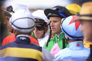NEWCASTLE, AUSTRALIA - NOVEMBER 12: Tommy Berry looks on during Sydney Racing at Newcastle Racecourse on November 12, 2022 in Newcastle, Australia. (Photo by Mark Evans/Getty Images)