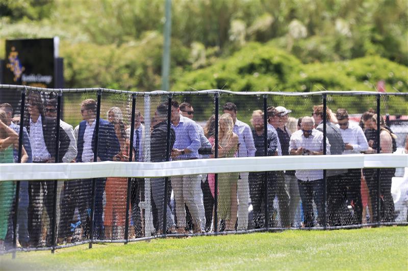KEMBLA GRANGE, AUSTRALIA - NOVEMBER 19: Race-goers line up to enter the track during Sydney Racing at Kembla Grange Racecourse on November 19, 2022 in Kembla Grange, Australia. (Photo by Mark Evans/Getty Images)