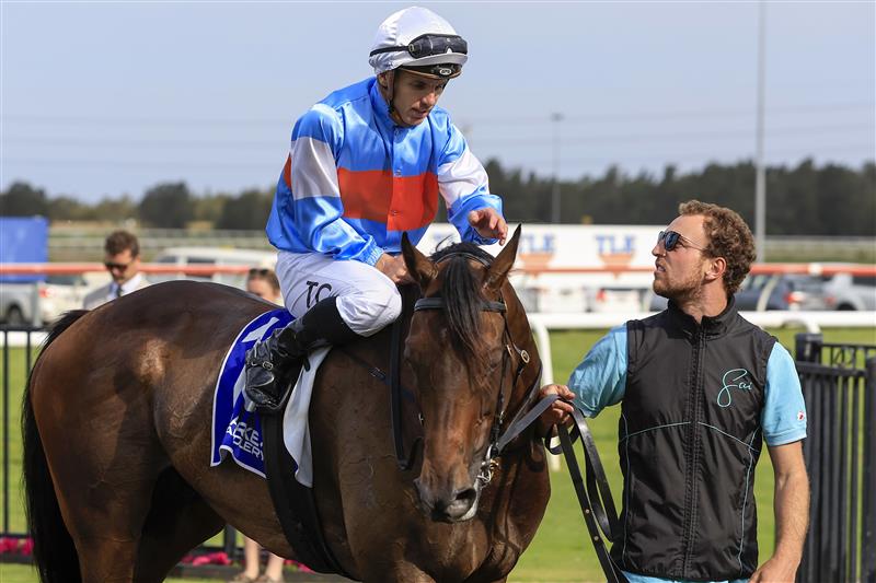 KEMBLA GRANGE, AUSTRALIA - NOVEMBER 19: Tim Clark returns to scale after winning race 8 The Gong on Riodini during Sydney Racing at Kembla Grange Racecourse on November 19, 2022 in Kembla Grange, Australia. (Photo by Mark Evans/Getty Images)