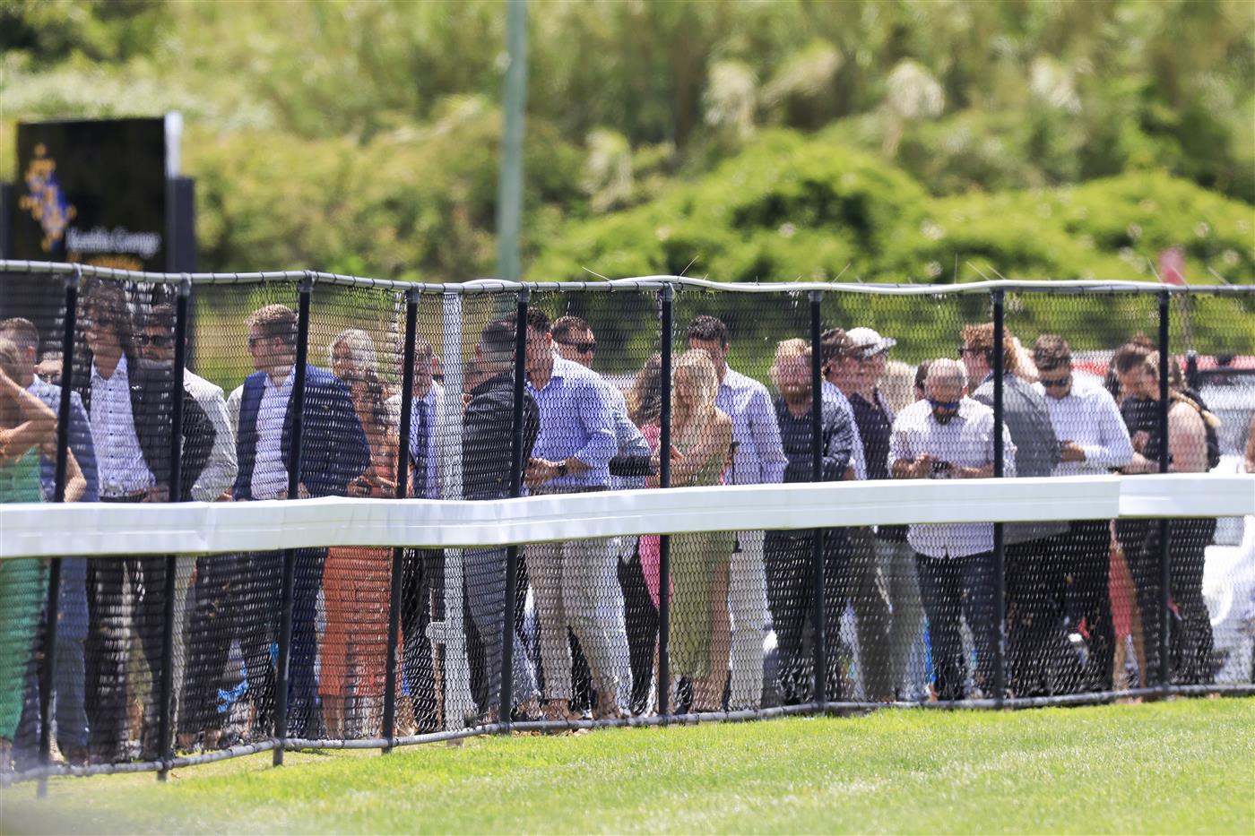 KEMBLA GRANGE, AUSTRALIA - NOVEMBER 19: Race-goers line up to enter the track during Sydney Racing at Kembla Grange Racecourse on November 19, 2022 in Kembla Grange, Australia. (Photo by Mark Evans/Getty Images)