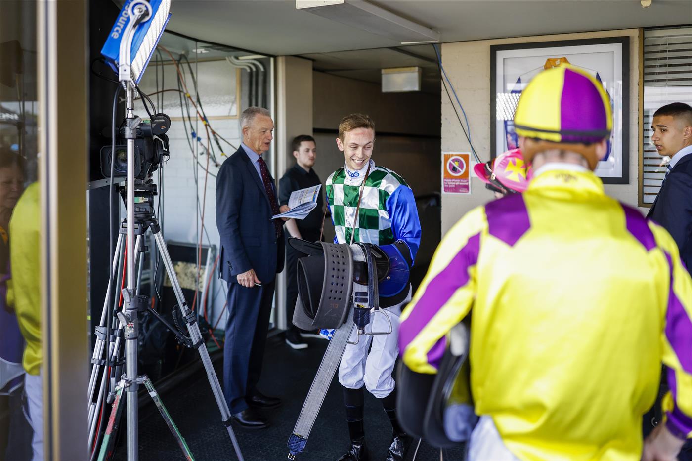 KEMBLA GRANGE, AUSTRALIA - NOVEMBER 19: Dylan Gibbons smiles as he weighs in after winning race 2 the Count De Rupee Midway Benchmark 72 Handicap on Astero during Sydney Racing at Kembla Grange Racecourse on November 19, 2022 in Kembla Grange, Australia. (Photo by Mark Evans/Getty Images)