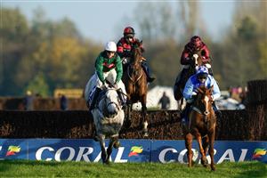 NEWBURY, ENGLAND - NOVEMBER 25: Connor Brace riding Paint The Dream (2L) clear the water jump before comfortably winning The Coral Bet Bundles Handicap Chase at Newbury Racecourse on November 25, 2022 in Newbury, England. (Photo by Alan Crowhurst/Getty Images)