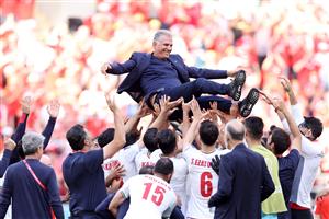 Iran head coach Carlos Queiroz celebrates with his team (Getty Images)