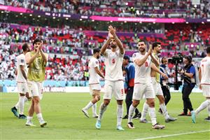 Iran players applaud fans after the 2-0 win (Getty Images)