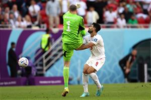 Mehdi Taremi of IR Iran is fouled by Wayne Hennessey of Wales (Getty Images)