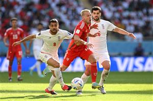 Aaron Ramsey of Wales battles for possession with Morteza Pouraliganji of IR Iran (Getty Images)