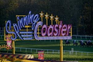 NEWBURY, ENGLAND - NOVEMBER 25: A general view as runners race down the back straight during The Coral Get Closer To The Action Novices