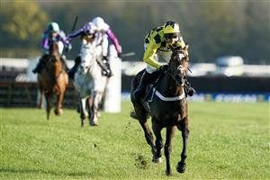 NEWBURY, ENGLAND - NOVEMBER 25: Nico de Boinville riding Jet Powered clear the last to easily win The Coral Bet Bundles