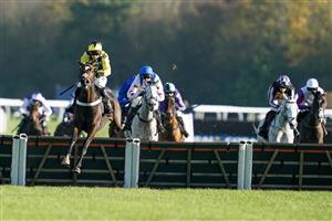 NEWBURY, ENGLAND - NOVEMBER 25: Nico de Boinville riding Jet Powered clear the last to easily win The Coral Bet Bundles