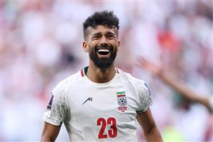 Ramin Rezaeian of IR Iran celebrates scoring his side's second goal (Getty Images)