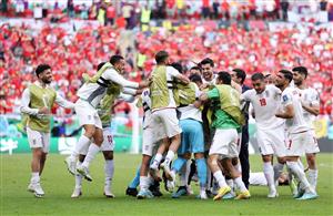 Roozbeh Cheshmi of IR Iran celebrates with teammates (Getty Images)