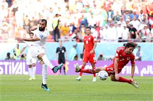 Roozbeh Cheshmi scores Iran's opener (Getty Images)