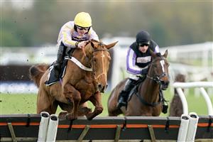 NEWBURY, ENGLAND - NOVEMBER 26: James Bowen riding Luccia clear the last to win The Play Coral