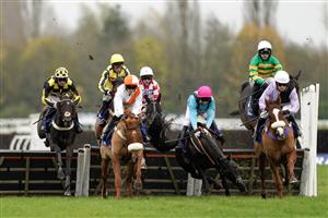 NEWBURY, ENGLAND - NOVEMBER 26: Jockey Paddy Brennan manages to stay onboard Peking Rose after a mistake during The Coral Racing Club Handicap Hurdle at Newbury Racecourse on November 26, 2022 in Newbury, England. (Photo by Alan Crowhurst/Getty Images)