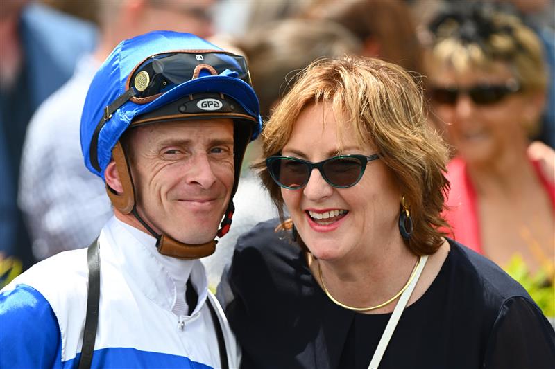 MELBOURNE, AUSTRALIA - NOVEMBER 26: Daniel Moor poses with trainer Cindy Alderson after riding Jigsaw to win Race 3, the Premier Signs Doveton Stakes, during Melbourne Racing at Caulfield Racecourse on November 26, 2022 in Melbourne, Australia. (Photo by Vince Caligiuri/Getty Images)