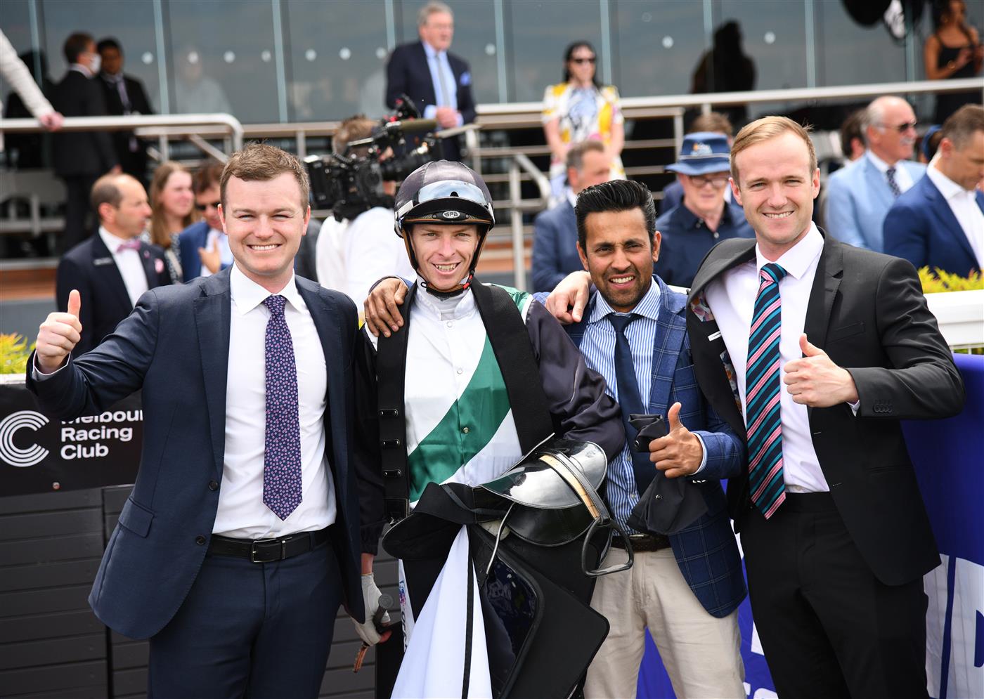 MELBOURNE, AUSTRALIA - NOVEMBER 26: Michael Dee poses with trainers trainers Ben and JD Hayes after riding Little Brose to win Race 1, the Thoroughbred Club Merson Cooper Stakes, during Melbourne Racing at Caulfield Racecourse on November 26, 2022 in Melbourne, Australia. (Photo by Vince Caligiuri/Getty Images)