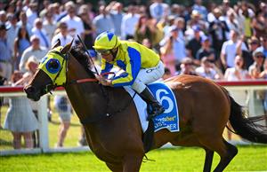 MELBOURNE, AUSTRALIA - DECEMBER 03: Damien Oliver riding Kissinger winning Race 7, the Sportsbet Pakenham Cup, during Melbourne Racing at Pakenham Racecourse on December 03, 2022 in Melbourne, Australia. (Photo by Vince Caligiuri/Getty Images)