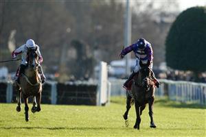 SUNBURY, ENGLAND - DECEMBER 26: Aidan Coleman riding Paisley Park (R) clear the last to win The Ladbrokes Long Walk Hurdle at Kempton Park Racecourse on December 26, 2022 in Sunbury, England. (Photo by Alan Crowhurst/Getty Images)