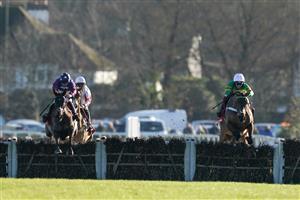SUNBURY, ENGLAND - DECEMBER 26: Aidan Coleman riding Paisley Park (L) clear the last to win The Ladbrokes Long Walk Hurdle at Kempton Park Racecourse on December 26, 2022 in Sunbury, England. (Photo by Alan Crowhurst/Getty Images)